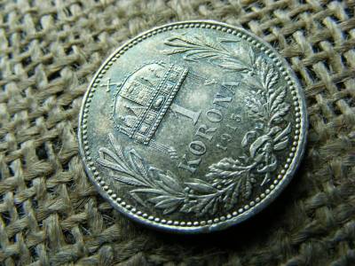 Ezüst 1 korona, 1915, enyhén félrevert