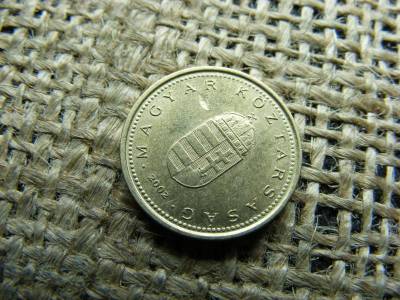 1 forintos érme, 2002, verdehibás, idegen anyag benyomódás