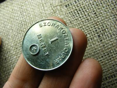 Szórakoztatóipari zseton, érem, tantusz