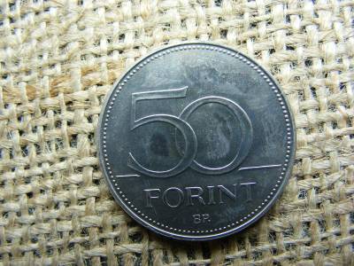 50 forintos érme, 1999, verdehibás, idegen anyag benyomódás