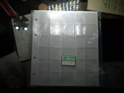 Kobra , Érmetartó , éremtartó , érme berakó lap ! 10 db 30 férőhelyes ! Ár / zacskó ( 10 lap , 10 elválasztó ) Új !